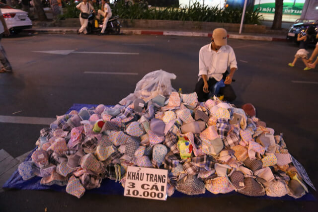 Buy a face mask when traveling in HCMC
