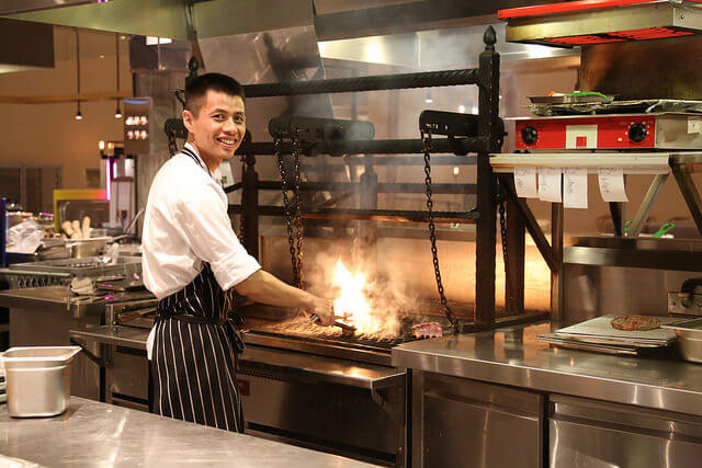 Chef cooking some steaks for dinner